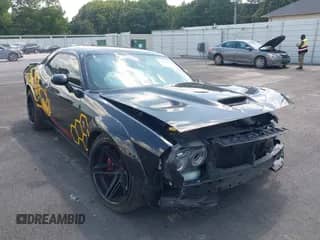 2022 Dodge Challenger R/T Scat Pack Widebody z VIN 2C3CDZFJ3NH151508, wystawiony jako IAAI lot #42812032 z przebiegiem 26 122 mil mil oraz . Historia ofert i sprzedaży dostępna na DreamBid. Obrazek 1.