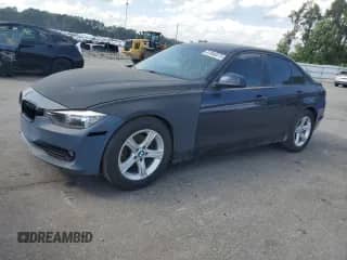 2014 BMW 3 Series 320i with VIN WBA3B1G56ENS77466, listed as a Copart auction lot 81846475 with 137,087 mi miles and Salvage title. Bid and sale history available at DreamBid. Image 1.