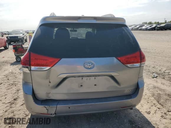 2012 Toyota Sienna LE with VIN 5TDKK3DC1CS276911, listed as a Copart auction lot 89585945 with 209,475 mi miles and Clean title. Bid and sale history available at DreamBid. Image 6.