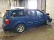 2010 Dodge Grand Caravan Crew with VIN 2D4RN6DX1AR455209, listed as a Copart auction lot 71793615 with 243,904 mi miles and Salvage title. Bid and sale history available at DreamBid. Image 3.