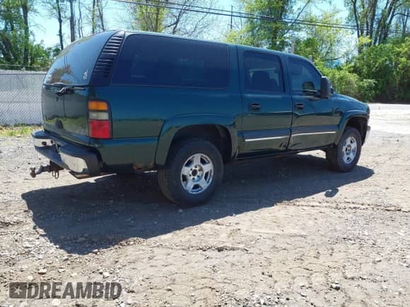 2003 Chevrolet Suburban LT z VIN 3GNEC16Z73G323056, wystawiony jako IAAI lot #42104085 z przebiegiem 253 484 mil mil oraz . Historia ofert i sprzedaży dostępna na DreamBid. Obrazek 4.
