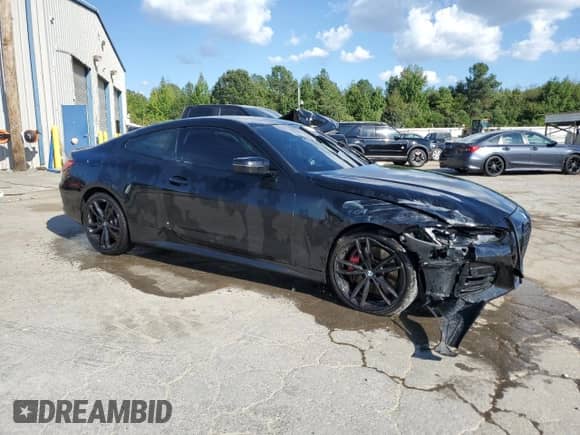 2023 BMW 4 Series 430i xDrive with VIN WBA73AP02PCL47210, listed as a Copart auction lot 72401194 with 27,518 mi miles and Salvage title. Bid and sale history available at DreamBid. Image 4.