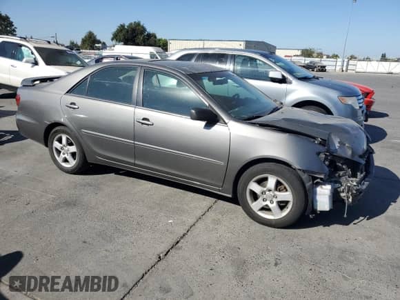 2005 Toyota Camry LE с VIN 4T1BE30K65U611529, выставлен на аукционе Copart как лот 81284905 с пробегом 309 557 миль миль и Списание • Salvage title. История ставок и продаж доступна на DreamBid. Изображение 4.