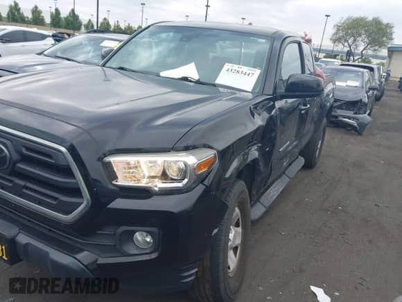 2018 Toyota Tacoma SR with VIN 5TFRX5GN1JX122683, listed as a IAAI auction lot 43283447 with 89,252 mi miles and . Bid and sale history available at DreamBid. Image 18.