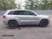 2019 Jeep Grand Cherokee Laredo E with VIN 1C4RJFAG7KC853886, listed as a IAAI auction lot 42013214 with 84,836 mi miles and . Bid and sale history available at DreamBid. Image 13.