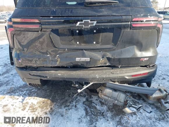 2024 Chevrolet Traverse AWD Z71 z VIN 1GNEVJKS0RJ155142, wystawiony jako IAAI lot #41346737 z przebiegiem 15 669 mil mil oraz . Historia ofert i sprzedaży dostępna na DreamBid. Obrazek 6.
