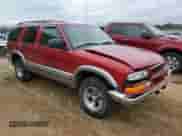2000 Chevrolet Blazer LT with VIN 1GNCS13W3Y2213772, listed as a Copart auction lot 79964794 with 80,090 mi miles and Salvage title. Bid and sale history available at DreamBid. Image 4.