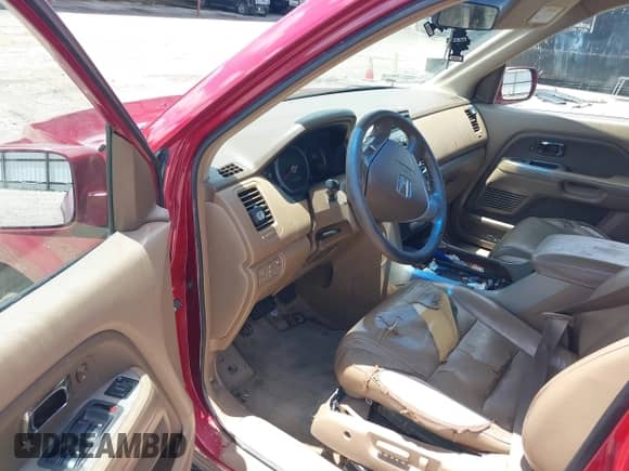 2006 Honda Pilot EX-L z VIN 5FNYF285X6B023146, wystawiony jako IAAI lot #42395707 z przebiegiem Nie podano mil oraz . Historia ofert i sprzedaży dostępna na DreamBid. Obrazek 13.