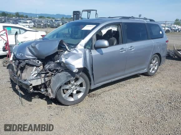 2012 Toyota Sienna SE with VIN 5TDXK3DC7CS258273, listed as a IAAI auction lot 42444615 with Not provided miles and . Bid and sale history available at DreamBid. Image 19.