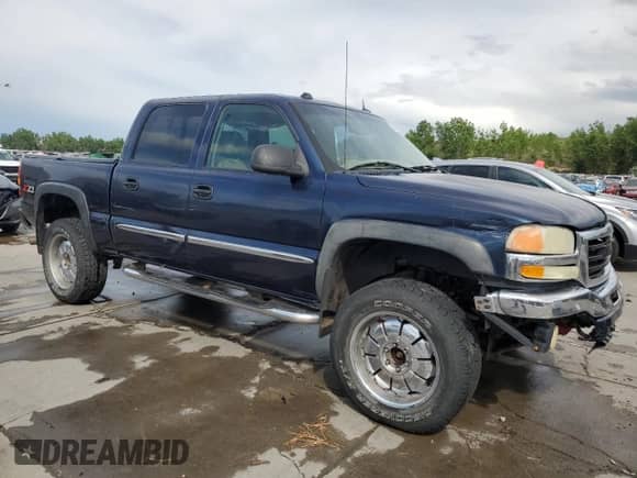 2005 GMC Sierra 1500 SLE z VIN 2GTEK13T751200347, wystawiony jako Copart lot #60863495 z przebiegiem 272 891 mil mil oraz Czysty tytuł • Clean title. Historia ofert i sprzedaży dostępna na DreamBid. Obrazek 4.
