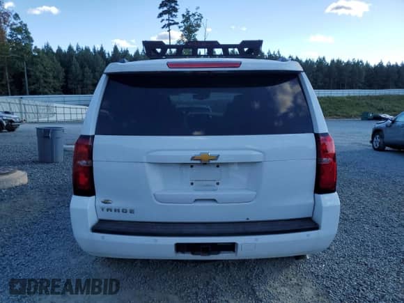 2015 Chevrolet Tahoe LT with VIN 1GNSKBKC9FR274007, listed as a Copart auction lot 85695475 with 154,474 mi miles and Salvage title. Bid and sale history available at DreamBid. Image 6.