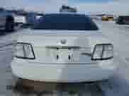 1997 Honda Accord EX с VIN 1HGCD7264VA031931, выставлен на аукционе Copart как лот 45344965 с пробегом 75 442 миль миль и Списание • Salvage title. История ставок и продаж доступна на DreamBid. Изображение 6.