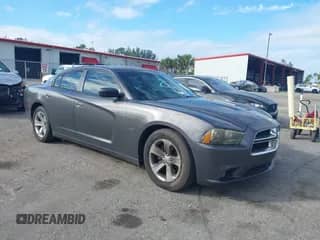2013 Dodge Charger RT z VIN 2C3CDXCT1DH617932, wystawiony jako IAAI lot #41359405 z przebiegiem 126 612 mil mil oraz . Historia ofert i sprzedaży dostępna na DreamBid. Obrazek 1.