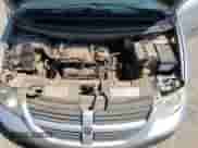 2007 Dodge Caravan SE z VIN 1D4GP25R97B101696, wystawiony jako Copart lot #80387895 z przebiegiem 149 731 mil mil oraz Czysty tytuł • Clean title. Historia ofert i sprzedaży dostępna na DreamBid. Obrazek 12.