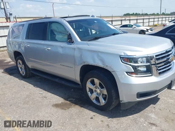 2018 Chevrolet Suburban LT z VIN 1GNSCHKC7JR317414, wystawiony jako IAAI lot #42874214 z przebiegiem 98 281 mil mil oraz . Historia ofert i sprzedaży dostępna na DreamBid. Obrazek 1.