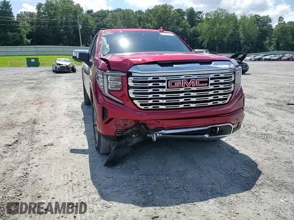 2022 GMC Sierra 1500 Denali with VIN 1GTUUGET5NZ562240, listed as a Copart auction lot 69827465 with 59,577 mi miles and Salvage title. Bid and sale history available at DreamBid. Image 13.