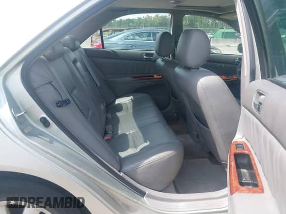 2002 Toyota Camry XLE with VIN JTDBF30K620081292, listed as a IAAI auction lot 42701432 with 146,950 mi miles and . Bid and sale history available at DreamBid. Image 8.