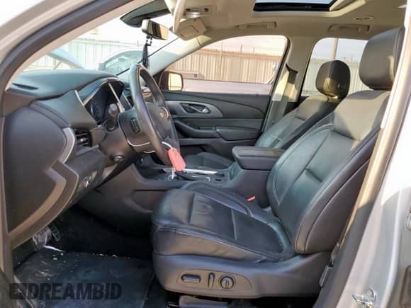 2018 Chevrolet Traverse Premier с VIN 1GNERKKW0JJ137709, выставлен на аукционе Copart как лот 80381215 с пробегом 107 527 миль миль и Списание • Salvage title. История ставок и продаж доступна на DreamBid. Изображение 7.