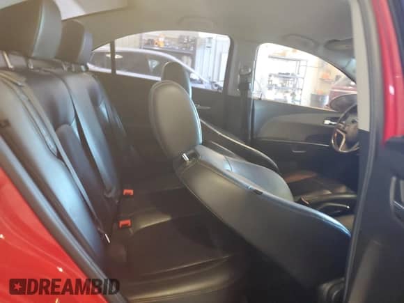 2013 Chevrolet Sonic LTZ с VIN 1G1JE5SG0D4164711, выставлен на аукционе Copart как лот 81845895 с пробегом 136 844 миль миль и Списание • Salvage title. История ставок и продаж доступна на DreamBid. Изображение 10.