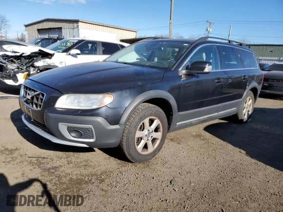 2012 Volvo XC70 3.2L z VIN YV4940BZ1C1141193, wystawiony jako Copart lot #88592985 z przebiegiem 203 487 mil mil oraz Czysty tytuł • Clean title. Historia ofert i sprzedaży dostępna na DreamBid. Obrazek 1.