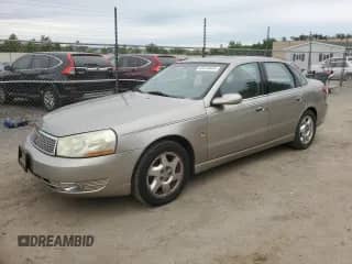 2003 Saturn LS with VIN 1G8JW54R43Y571225, listed as a Copart auction lot 58724605 with 62,252 mi miles and Clean title. Bid and sale history available at DreamBid. Image 1.