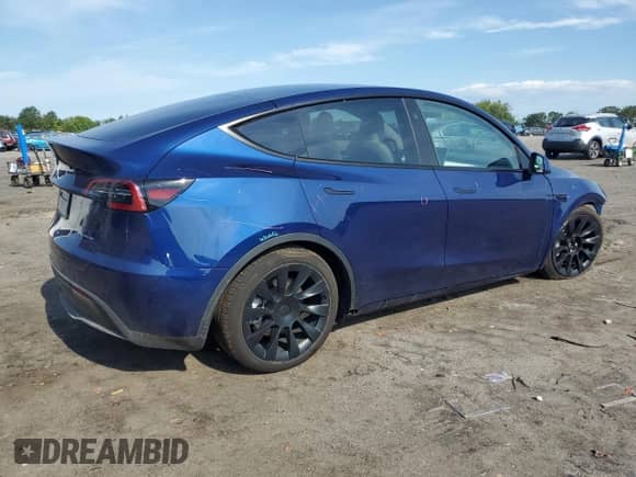 2023 Tesla Model Y Long Range с VIN 7SAYGDEE5PF910400, выставлен на аукционе Copart как лот 66009544 с пробегом 5 117 миль миль и Списание • Salvage title. История ставок и продаж доступна на DreamBid. Изображение 3.