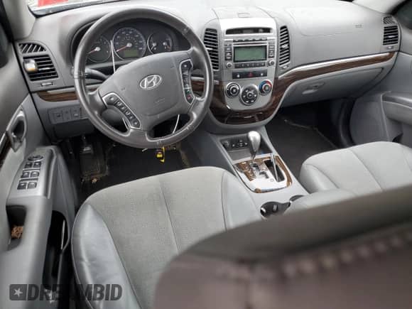 2012 Hyundai Santa Fe SE с VIN 5XYZHDAG0CG167699, выставлен на аукционе Copart как лот 63489204 с пробегом 87 528 миль миль и Списание • Salvage title. История ставок и продаж доступна на DreamBid. Изображение 8.