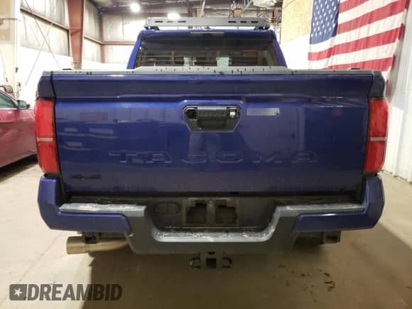 2024 Toyota Tacoma SR5 with VIN 3TMLB5JN1RM002946, listed as a Copart auction lot 68039525 with 21,113 mi miles and Salvage title. Bid and sale history available at DreamBid. Image 6.