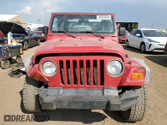 2003 Jeep Wrangler X z VIN 1J4FA39S33P308881, wystawiony jako Copart lot #69323655 z przebiegiem 264 257 mil mil oraz Szkoda całkowita • Salvage title. Historia ofert i sprzedaży dostępna na DreamBid. Obrazek 5.