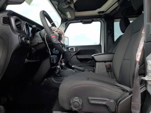 2023 Jeep Wrangler Sport с VIN 1C4GJXANXPW639931, выставлен на аукционе Copart как лот 79096154 с пробегом 5 467 миль миль и Списание • Salvage title. История ставок и продаж доступна на DreamBid. Изображение 7.