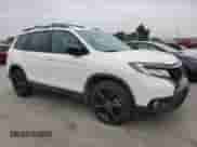 2019 Honda Passport Elite with VIN 5FNYF8H05KB009575, listed as a Copart auction lot 68778215 with 70,468 mi miles and Salvage title. Bid and sale history available at DreamBid. Image 4.