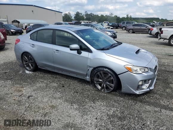 2017 Subaru WRX Premium with VIN JF1VA1E60H8814044, listed as a Copart auction lot 60159555 with 112,395 mi miles and Salvage title. Bid and sale history available at DreamBid. Image 4.