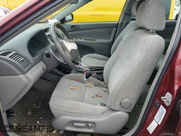 2002 Toyota Camry XLE z VIN 4T1BF32K02U023924, wystawiony jako Copart lot #80752185 z przebiegiem 117 715 mil mil oraz Nie do naprawy • Non repairable. Historia ofert i sprzedaży dostępna na DreamBid. Obrazek 7.