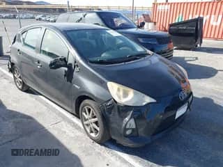 2013 Toyota Prius One z VIN JTDKDTB3XD1036557, wystawiony jako IAAI lot #41363703 z przebiegiem Nie podano mil oraz . Historia ofert i sprzedaży dostępna na DreamBid. Obrazek 1.