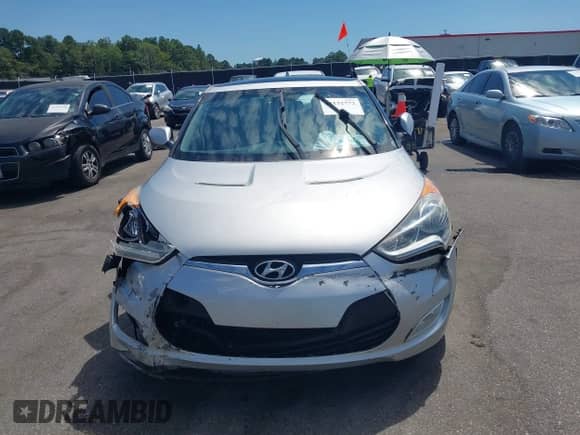 2012 Hyundai Veloster w/Gray Int z VIN KMHTC6AD0CU049684, wystawiony jako IAAI lot #43132772 z przebiegiem 114 146 mil mil oraz . Historia ofert i sprzedaży dostępna na DreamBid. Obrazek 12.