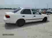 2001 Chevrolet Prizm with VIN 1Y1SK52831Z428219, listed as a Copart auction lot 59614015 with 242,375 mi miles and Salvage title. Bid and sale history available at DreamBid. Image 3.