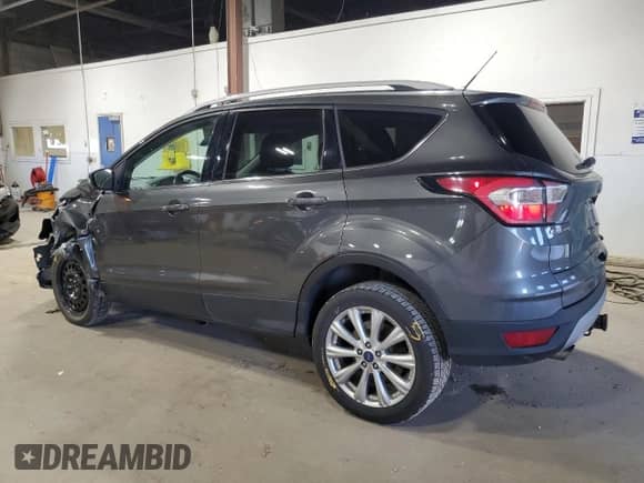 2017 Ford Escape Titanium with VIN 1FMCU9J92HUB60786, listed as a Copart auction lot 81855945 with 145,530 mi miles and Salvage title. Bid and sale history available at DreamBid. Image 2.