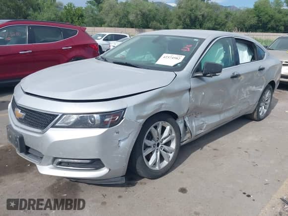 2018 Chevrolet Impala LT with VIN 1G1105SA1JU144554, listed as a IAAI auction lot 42374582 with 129,926 mi miles and . Bid and sale history available at DreamBid. Image 17.