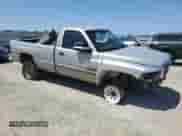 2000 Dodge 2500 with VIN 3B7KF2665YM215073, listed as a Copart auction lot 59399015 with 264,074 mi miles and Salvage title. Bid and sale history available at DreamBid. Image 4.