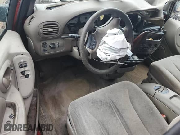 2002 Dodge Caravan ES z VIN 2B4GP54LX2R592721, wystawiony jako Copart lot #62667225 z przebiegiem Nie podano mil oraz Szkoda całkowita • Salvage title. Historia ofert i sprzedaży dostępna na DreamBid. Obrazek 8.