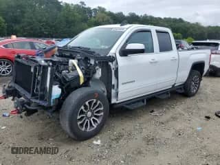 2019 GMC Sierra 1500 SLE with VIN 2GTV2MEC5K1237620, listed as a Copart auction lot 63623585 with 91,757 mi miles and Salvage title. Bid and sale history available at DreamBid. Image 1.