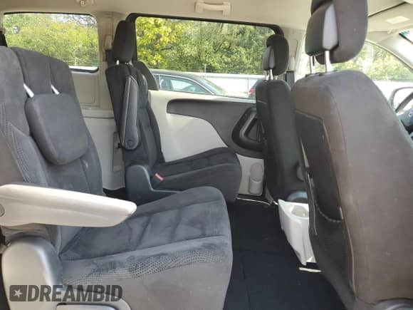 2016 Dodge Grand Caravan SXT with VIN 2C4RDGCGXGR339846, listed as a Copart auction lot 82103665 with 131,716 mi miles and Salvage title. Bid and sale history available at DreamBid. Image 11.