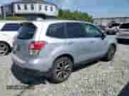 2018 Subaru Forester Premium with VIN JF2SJGECXJH411587, listed as a Copart auction lot 68100385 with 99,274 mi miles and Salvage title. Bid and sale history available at DreamBid. Image 3.