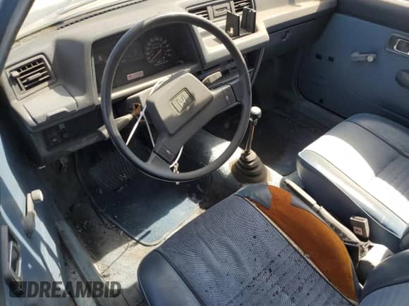 1983 Honda Civic z VIN JHMWD5526DS007016, wystawiony jako Copart lot #60973254 z przebiegiem 257 657 mil mil oraz Czysty tytuł • Clean title. Historia ofert i sprzedaży dostępna na DreamBid. Obrazek 8.