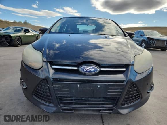 2014 Ford Focus Titanium with VIN 1FADP3J28EL224272, listed as a Copart auction lot 86531015 with 192,653 mi miles and Clean title. Bid and sale history available at DreamBid. Image 5.