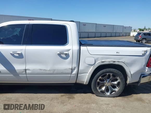 2020 Ram 1500 Longhorn with VIN 1C6SRFKM9LN229373, listed as a IAAI auction lot 42246047 with 134,671 mi miles and . Bid and sale history available at DreamBid. Image 6.