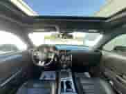 2014 Dodge Challenger SXT z VIN 2C3CDYAG8EH196532, wystawiony jako Copart lot #87491535 z przebiegiem 132 322 mil mil oraz Czysty tytuł • Clean title. Historia ofert i sprzedaży dostępna na DreamBid. Obrazek 9.