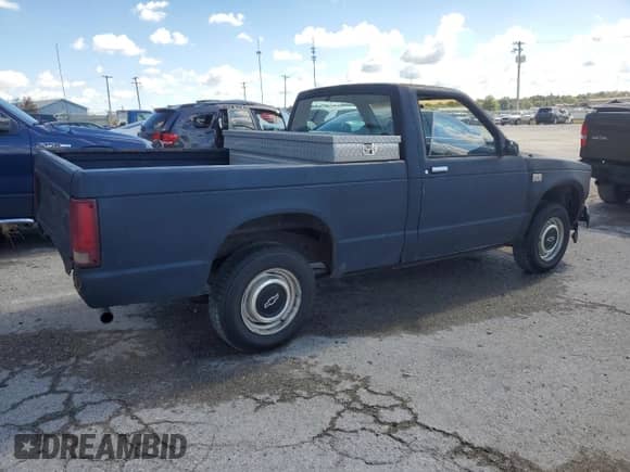 1988 Chevrolet S-10 с VIN 1GCBS14EXJ2211002, выставлен на аукционе Copart как лот 86115435 с пробегом 221 077 миль миль и На запчасти • Non repairable. История ставок и продаж доступна на DreamBid. Изображение 3.
