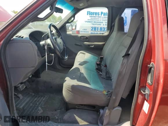 2001 Ford F-150 XL z VIN 1FTZX07261KA62955, wystawiony jako Copart lot #56580915 z przebiegiem 159 451 mil mil oraz Szkoda całkowita • Salvage title. Historia ofert i sprzedaży dostępna na DreamBid. Obrazek 7.