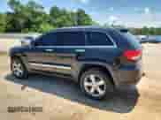 2012 Jeep Grand Cherokee Overland with VIN 1C4RJFCT9CC346497, listed as a Copart auction lot 63004635 with 142,623 mi miles and Salvage title. Bid and sale history available at DreamBid. Image 2.